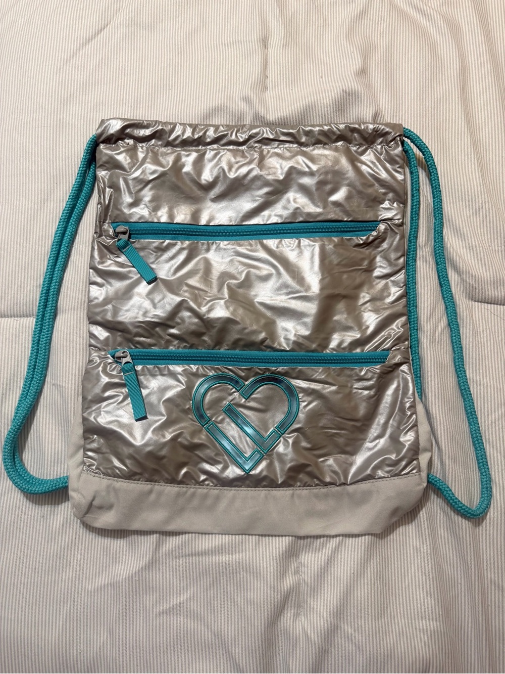 Y2K Vintage Metallic Silver Heart Drawstring Backpack with Teal Accents